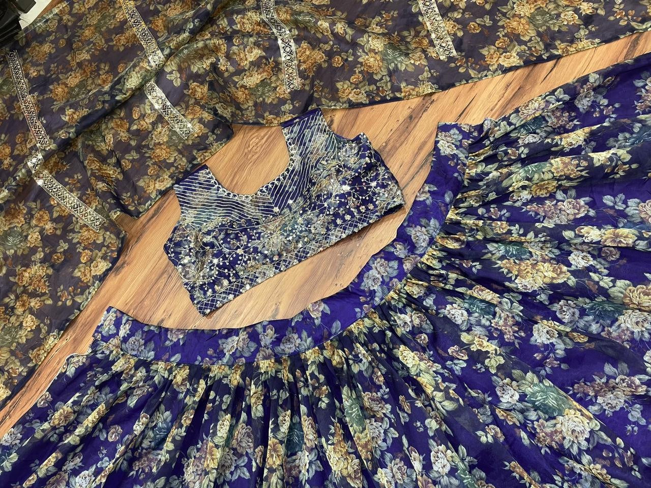 Blue organza silk embroidered sequence work lehenga choli