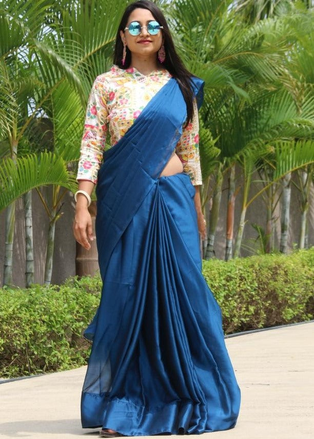 Blue rangoli silk party wear saree with embroidered blouse