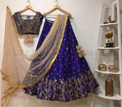 Blue tapeta silk embroidered wedding lehenga