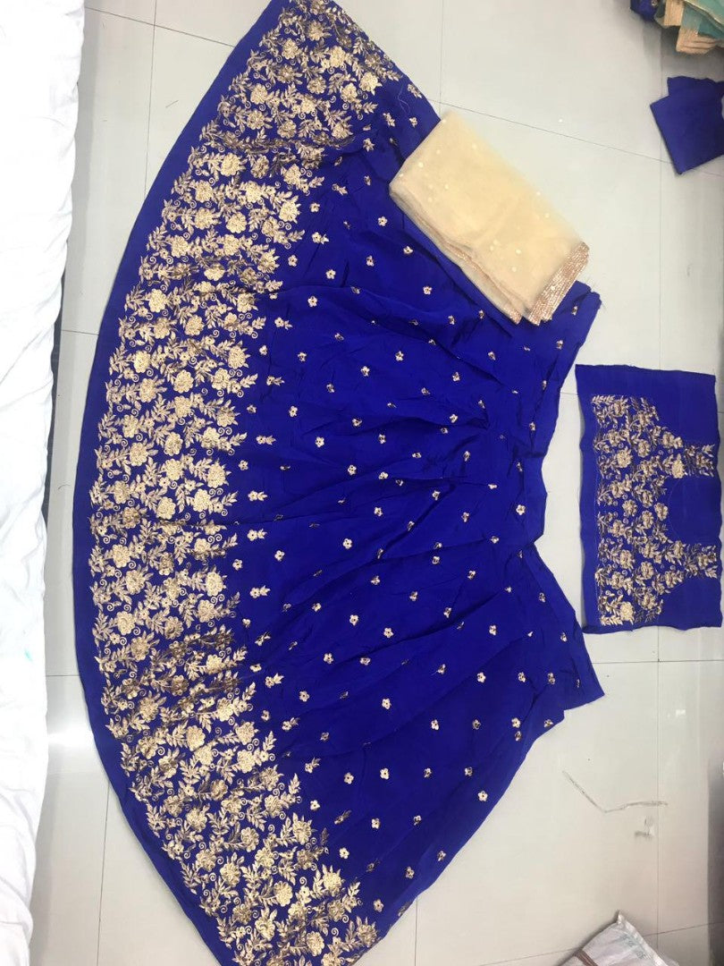 Blue tapeta silk embroidered wedding lehenga