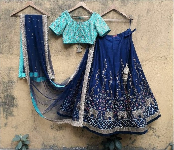 Blue tapeta silk embroidered wedding lehenga choli