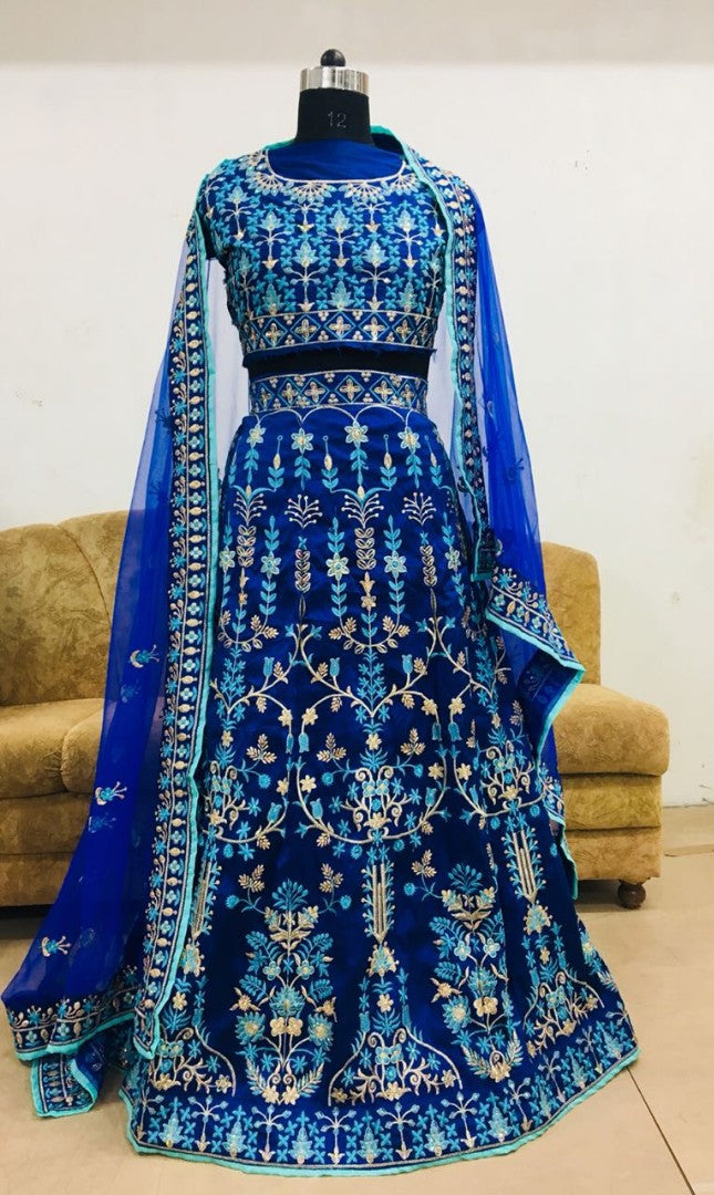 Blue tapeta silk heavy embroidered wedding lehenga