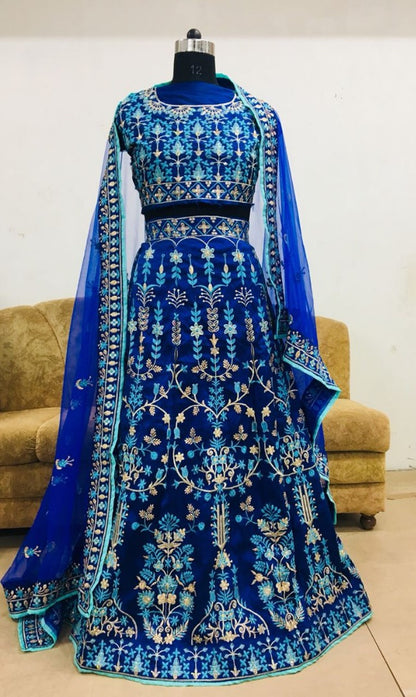 Blue tapeta silk heavy embroidered wedding lehenga