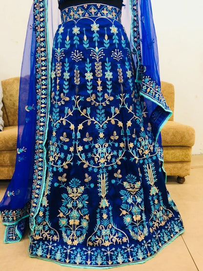 Blue tapeta silk heavy embroidered wedding lehenga