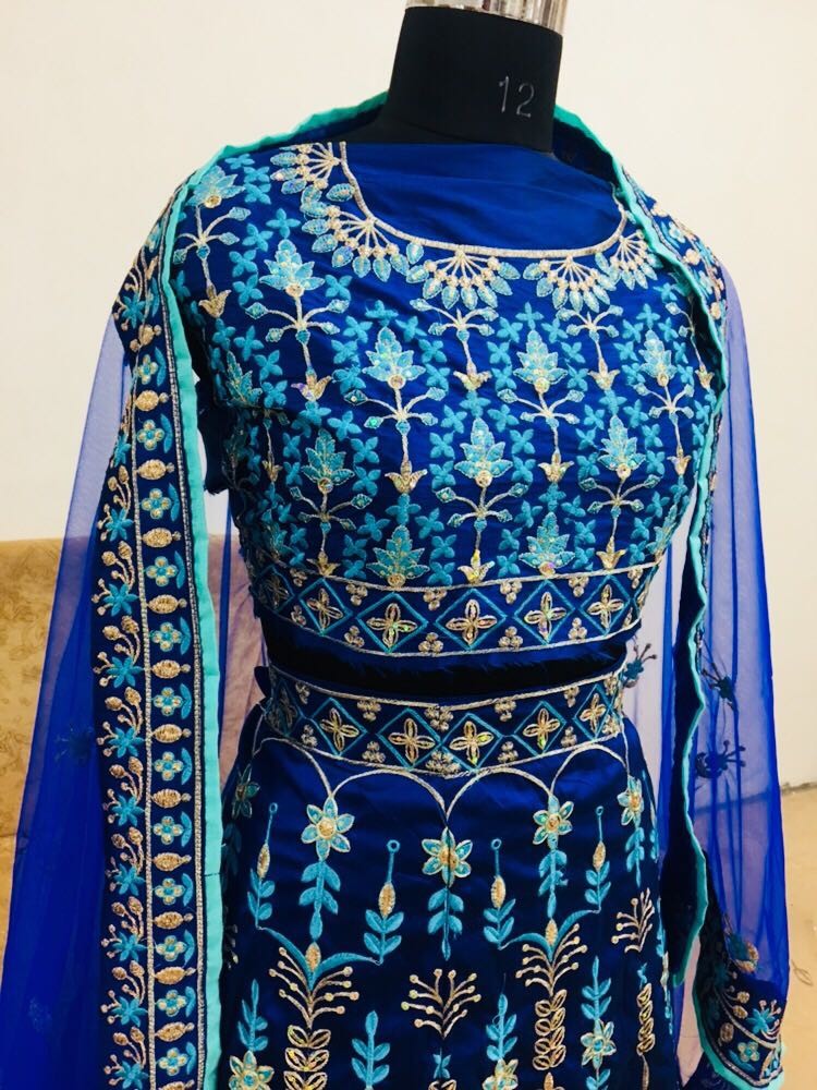 Blue tapeta silk heavy embroidered wedding lehenga