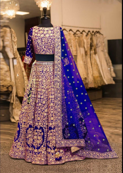 Blue velvet designer heavy embroidered bridal lehenga