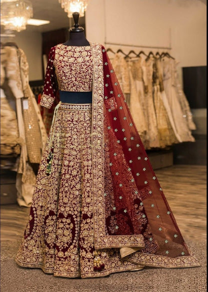 Blue velvet designer heavy embroidered bridal lehenga