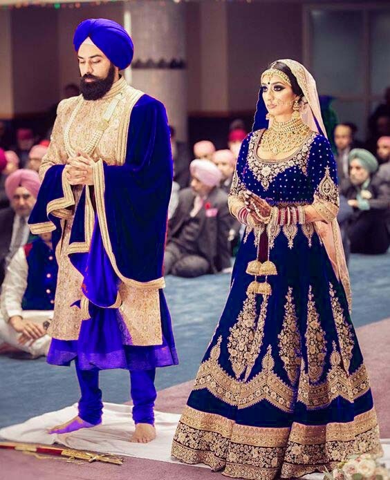 Blue velvet heavy embroidered bridal lehenga choli