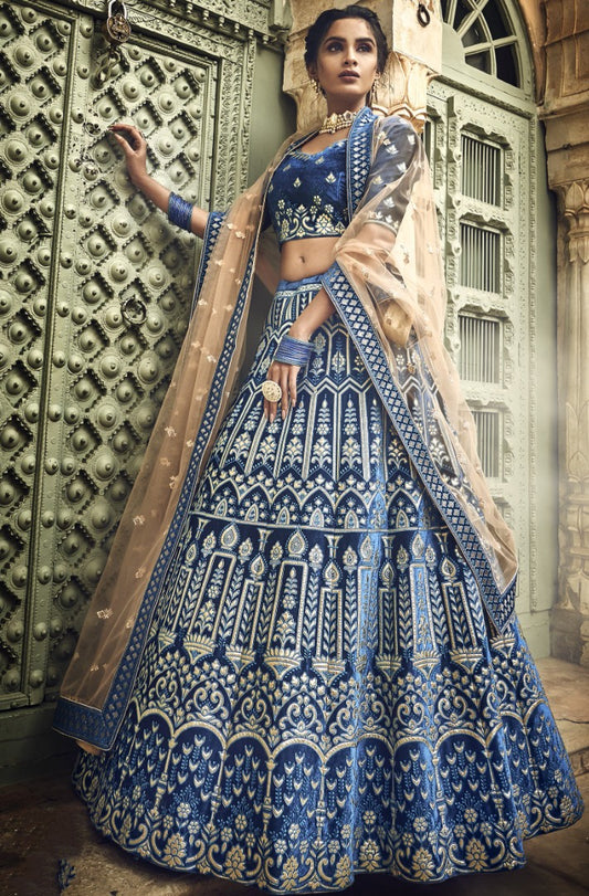 Blue velvet thread embroidered and zari work bridal lehenga choli