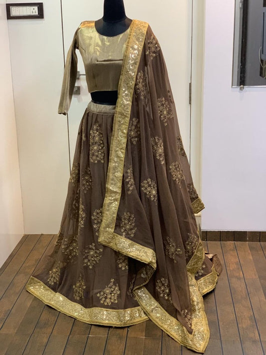 Brown georgette thread and zari worked wedding lehenga choli