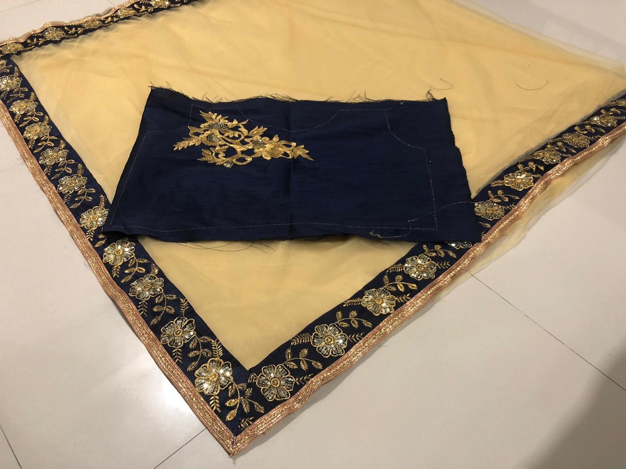 Brown net embroidered partywear saree