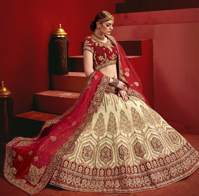 Cream and maroon heavy designer embroidered bridal lehenga choli