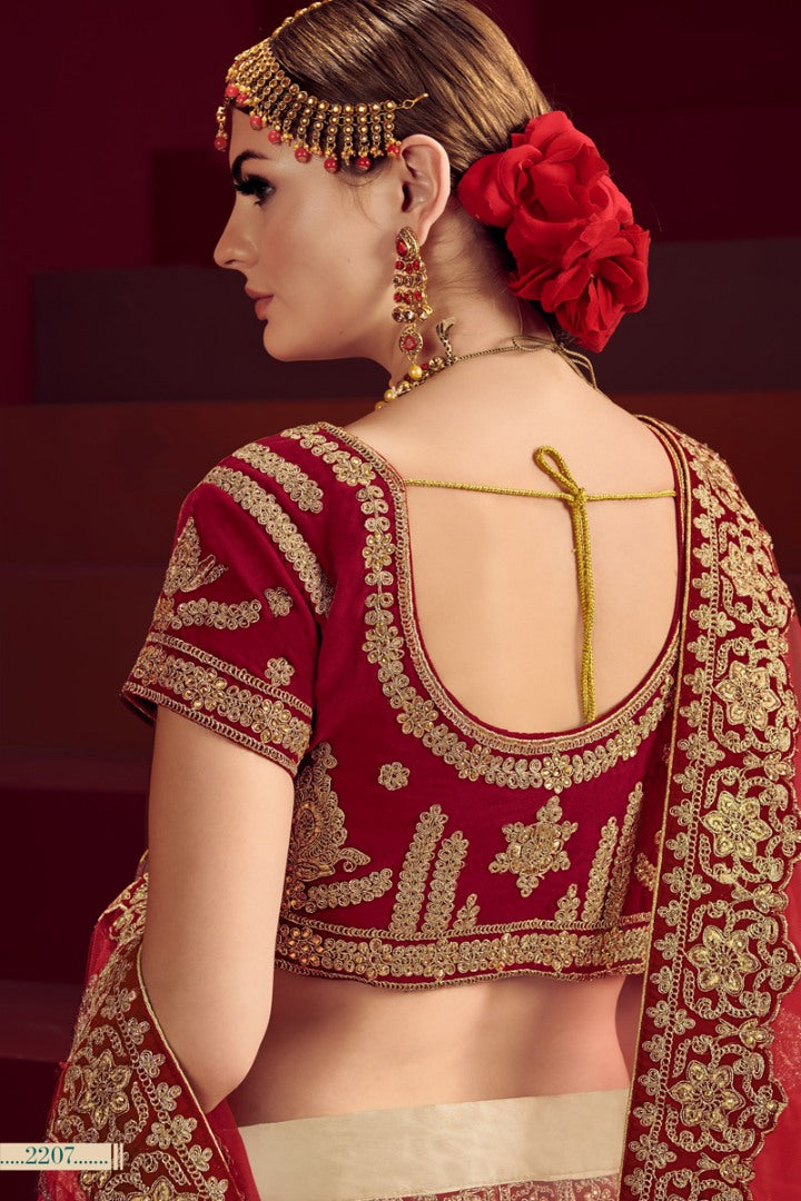 Cream and maroon heavy designer embroidered bridal lehenga choli