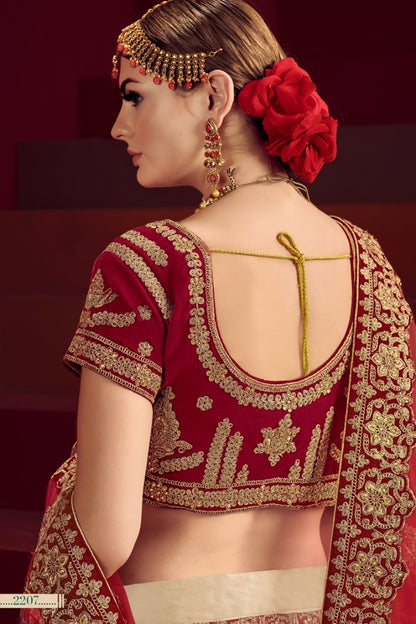 Cream and maroon heavy designer embroidered bridal lehenga choli