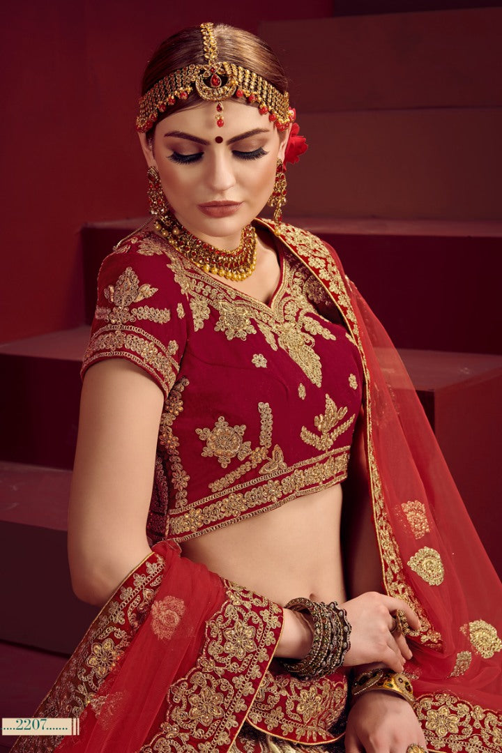 Cream and maroon heavy designer embroidered bridal lehenga choli