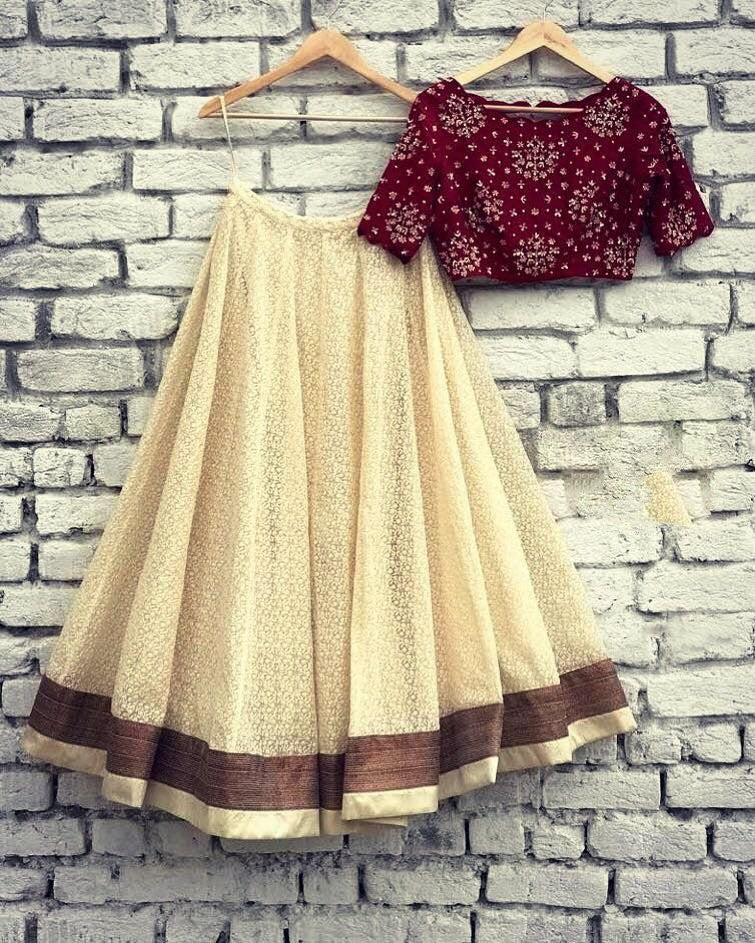 cream brasso net partywear lehenga with printed blouse