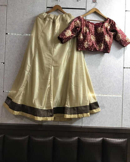 cream brasso net partywear lehenga with printed blouse