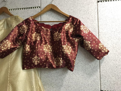 cream brasso net partywear lehenga with printed blouse