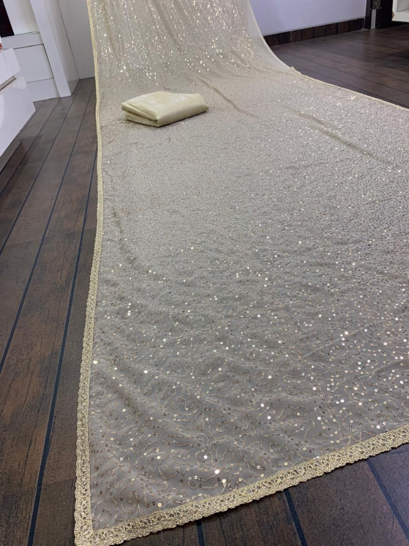 Cream georgette full sequence work saree
