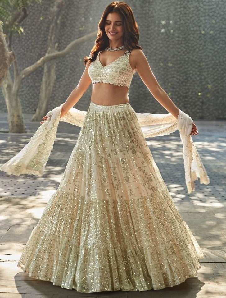 Cream georgette heavy sequins and thread work wedding lehenga choli