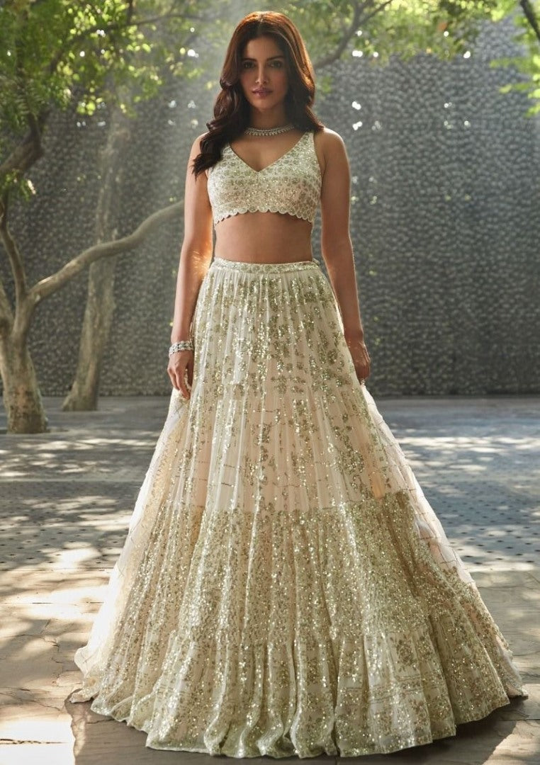 Cream georgette heavy sequins and thread work wedding lehenga choli