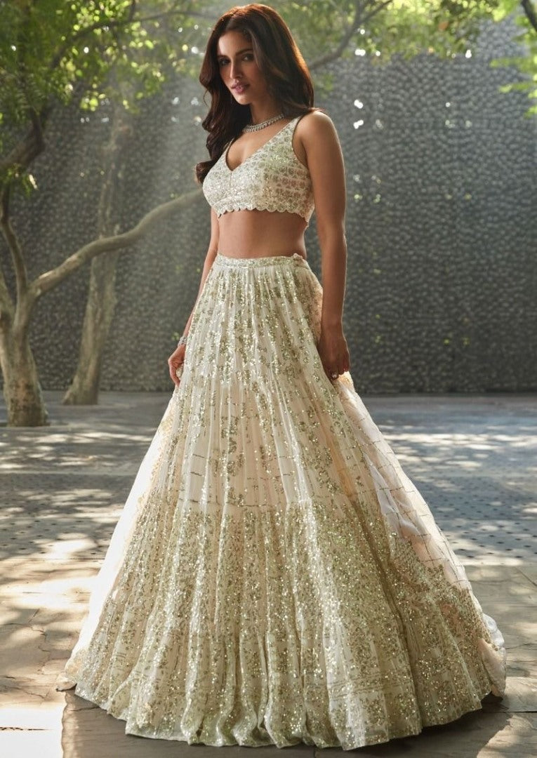 Cream georgette heavy sequins and thread work wedding lehenga choli