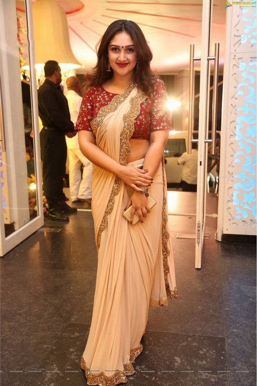 Cream georgette with sequence border partywear saree