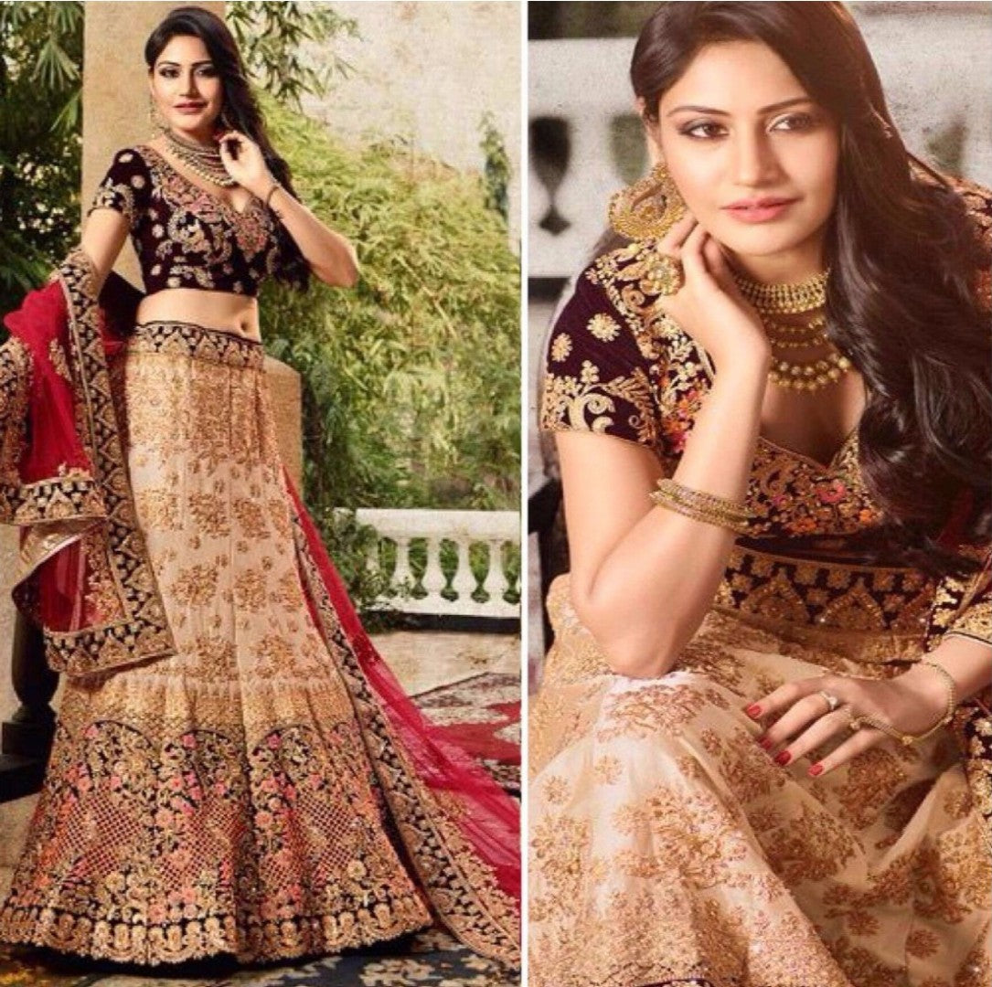 Cream heavy tapeta silk and velvet heavy embroidered bridal lehenga