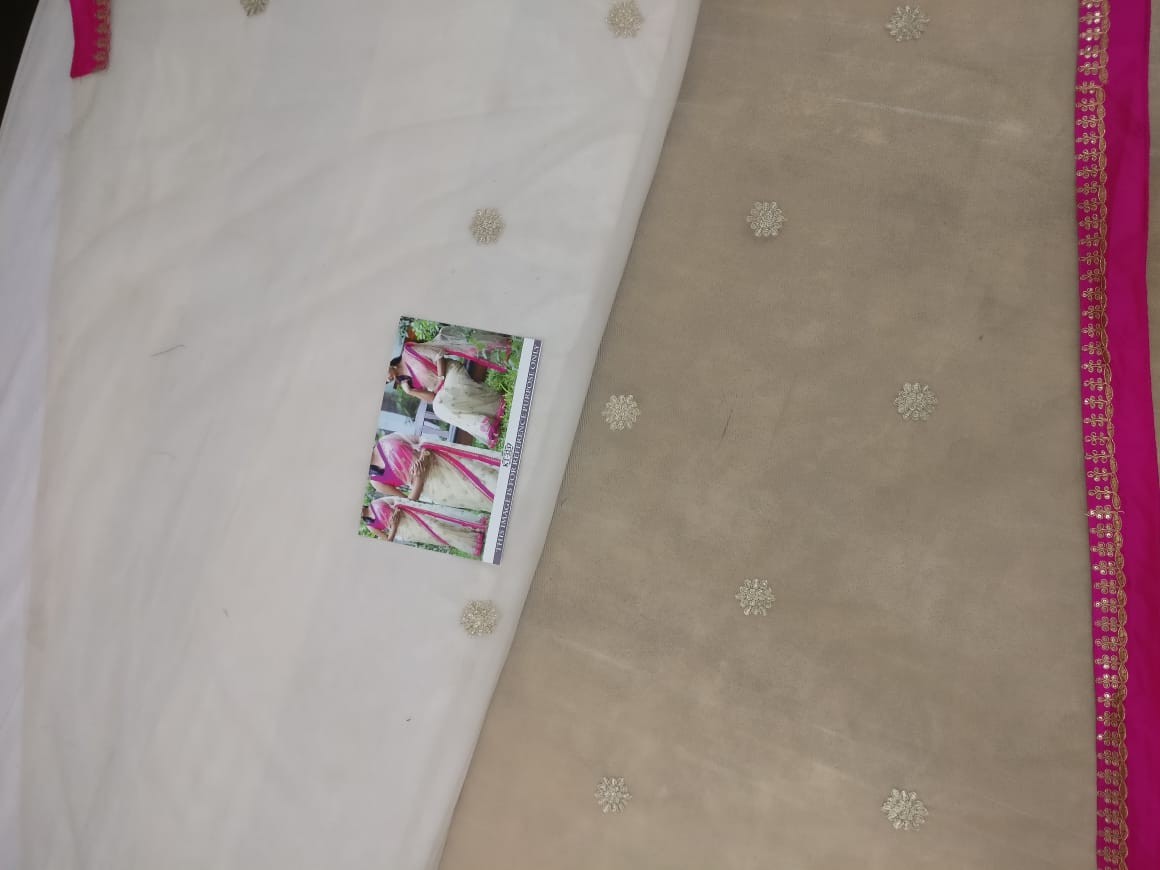 cream net fancy thread embroidered festival wear saree