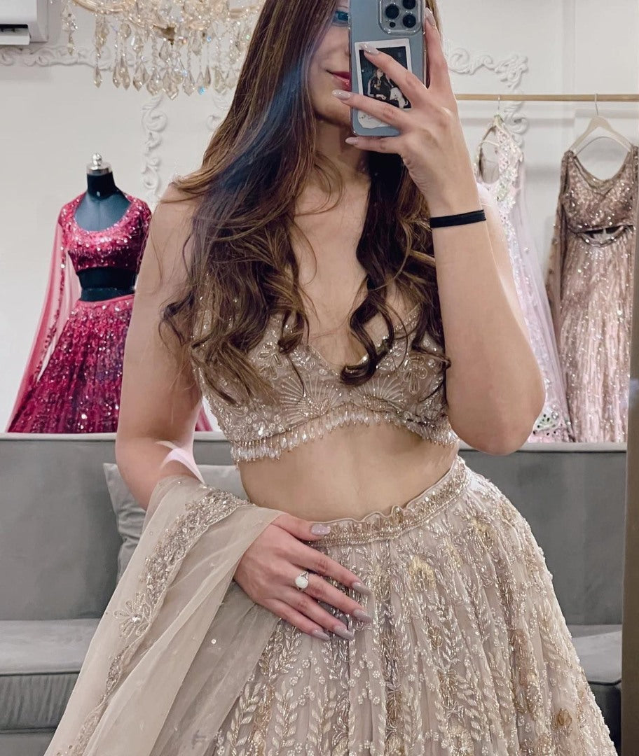 Cream net heavy work wedding lehenga choli