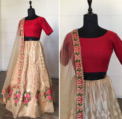 Cream net sequence embroidered ceremonial lehenga choli