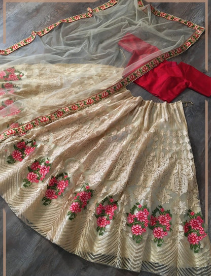 Cream net sequence embroidered ceremonial lehenga choli