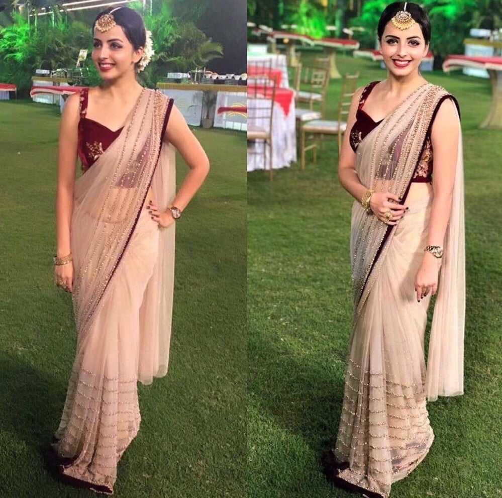 cream net sequence work partywear saree