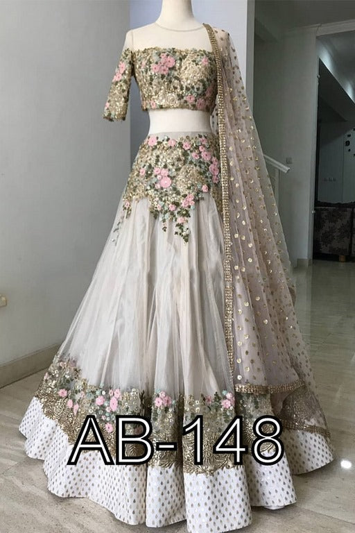 Cream net with cancan net embroidered wedding lehenga