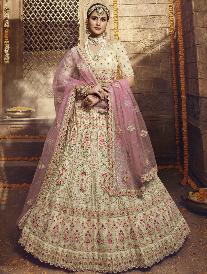 Cream organza thread zari and stone work bridal lehenga choli