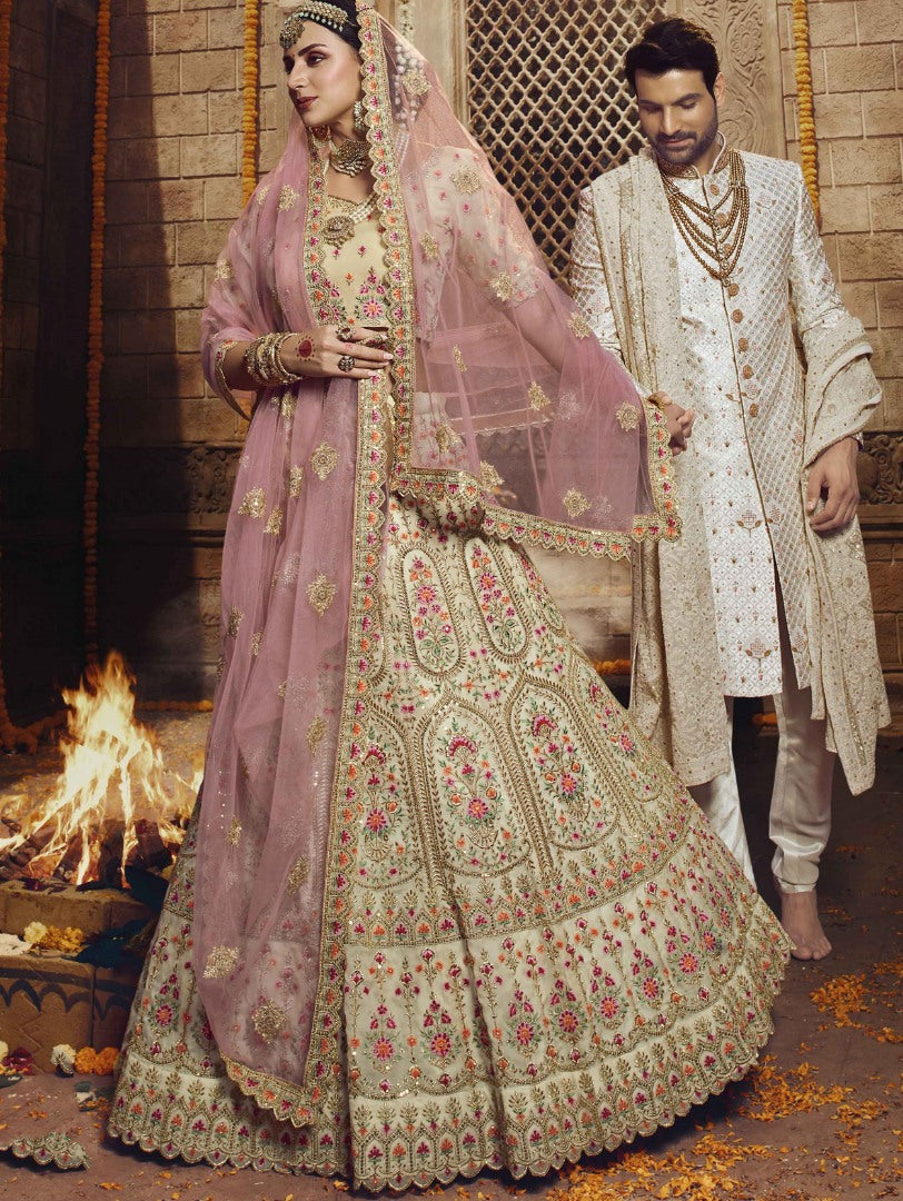 Cream organza thread zari and stone work bridal lehenga choli