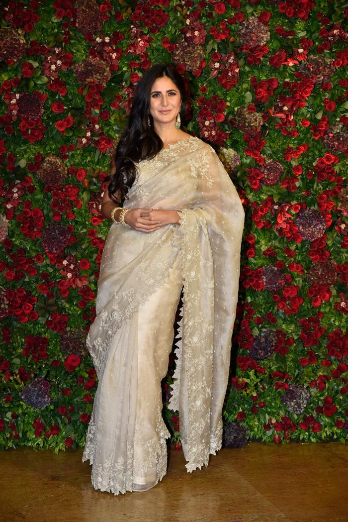 cream orgenza silk embroidered bollywood saree