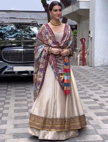 Cream satin silk kriti sanon lehenga gown
