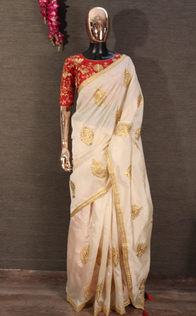 Cream zarna silk embroidered wedding wear saree