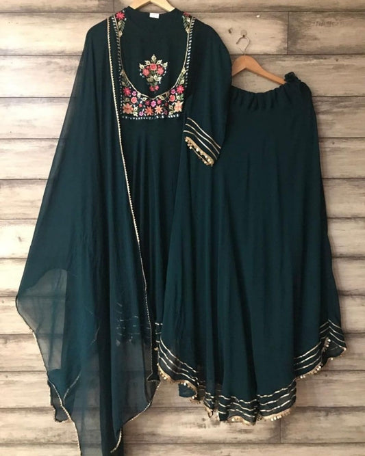 Dark green georgette embroidered lehenga suit