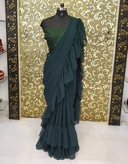 Dark green georgette pure ruffle saree