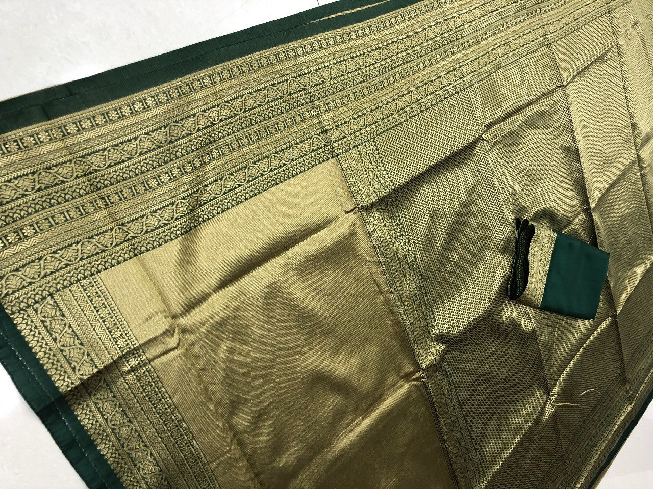 Dark green kanchipuran kota silk jacquad work wedding saree