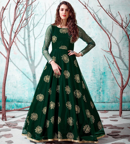 Dark green net metallic foil work party wear designer gown