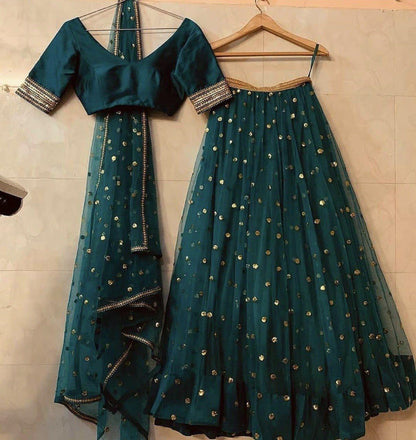 Dark green net wedding lehenga choli