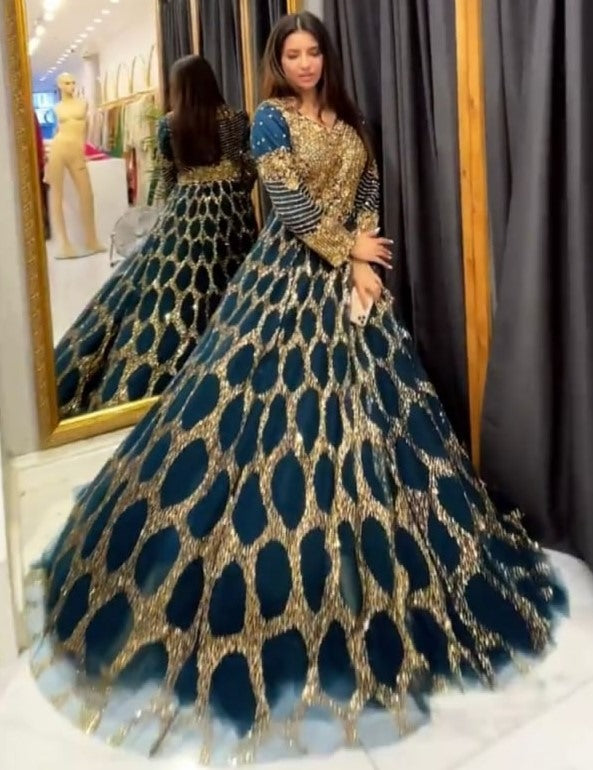 Dark green soft net heavy sequence embroidered party wear gown