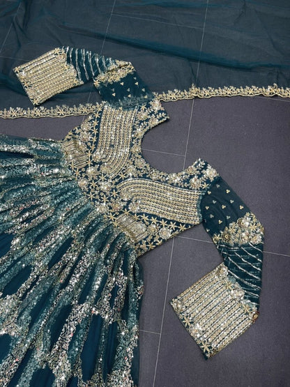 Dark green soft net heavy sequence embroidered party wear gown