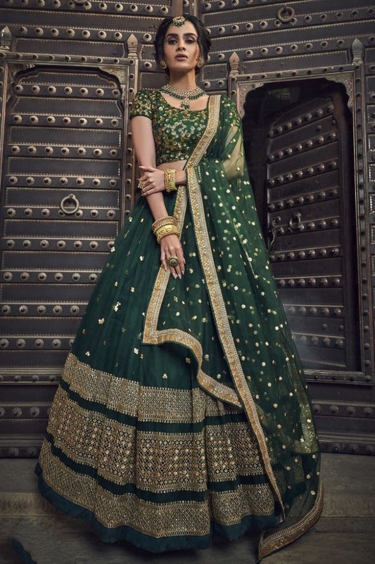 Dark green soft net sequence and zari work bridal lehenga choli