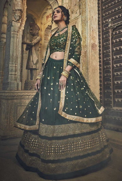 Dark green soft net sequence and zari work bridal lehenga choli