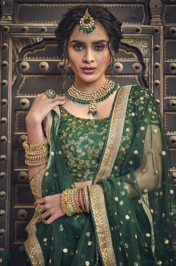 Dark green soft net sequence and zari work bridal lehenga choli