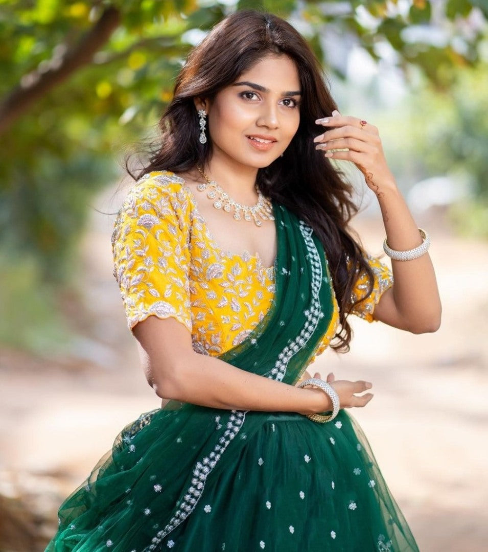 Dark green soft net sequence embroidered work ceremonial lehenga choli